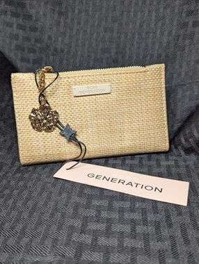 BCBGeneration Natural Beige Straw Floral Zip Wallet.